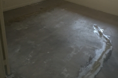 Concrete-overlay-before-carpet-removed-crack-repair