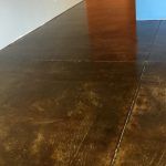 Picture of a recent Phoenix concrete floor stained by the Barefoot contractors