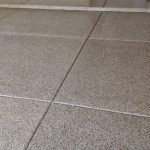 Prevent water damage in kitchens and bathrooms with epoxy floor coatings